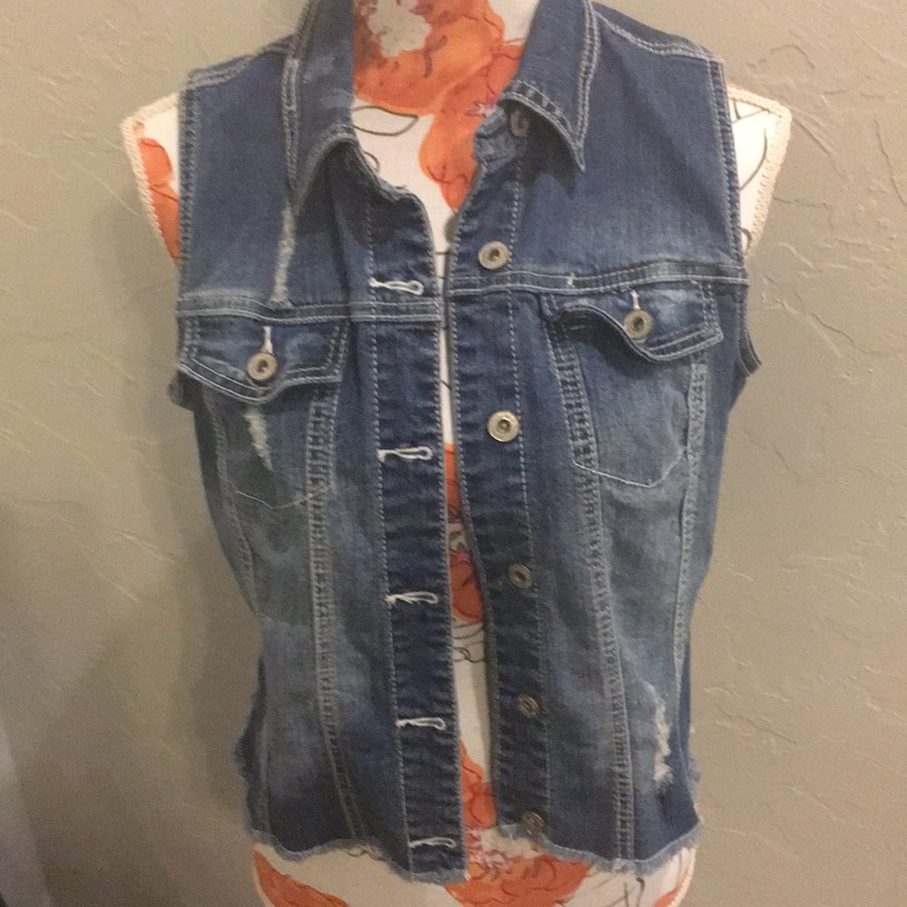 Distressed denim vest